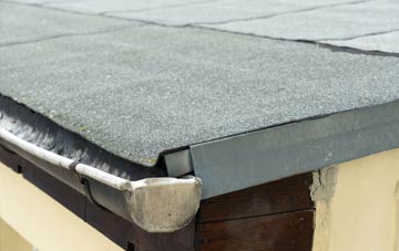 repair or replace Chuck Hatch flat roofing?
